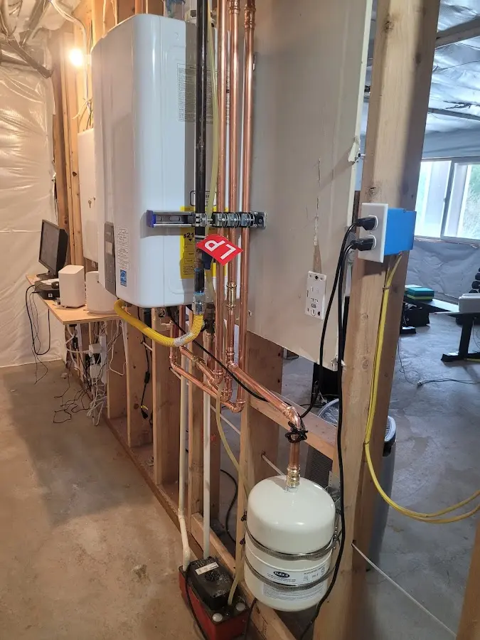 Licensed plumber repairing a kitchen sink in Aberdeen